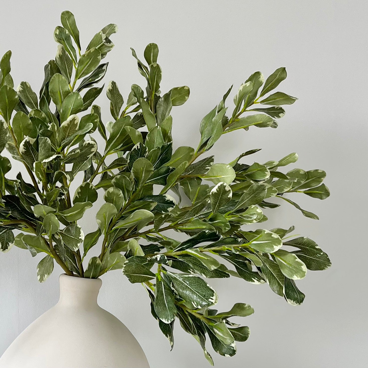 artificial flowers luxury faux silk green pittosporum leaf lifelike realistic faux flowers buy online from Amaranthine Blooms UK